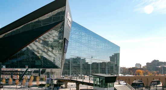 Photograph 2 - U.S. Bank Stadium Completed Project featuring transit lines and entryway and highlighting the steel truss.jpg